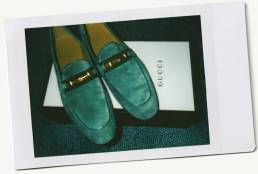 Polaroid of Gucci loafers