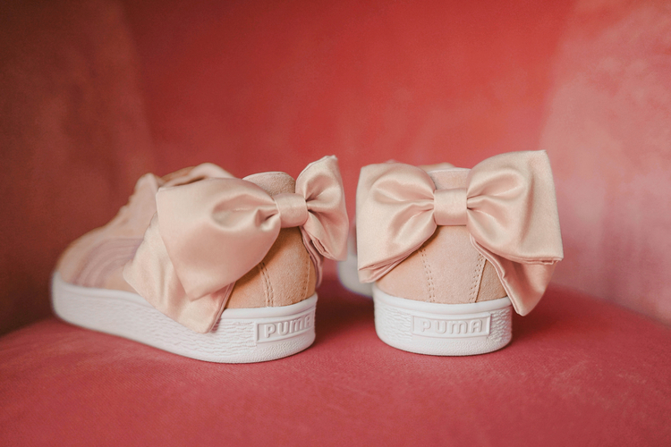 pink puma shoes with ribbon